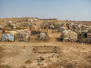 eritrea, landscape, tents, huts, refugee camp, nature, somalis, people, families, displaced, sand, dirt, plants, outside, brown camping, brown sand